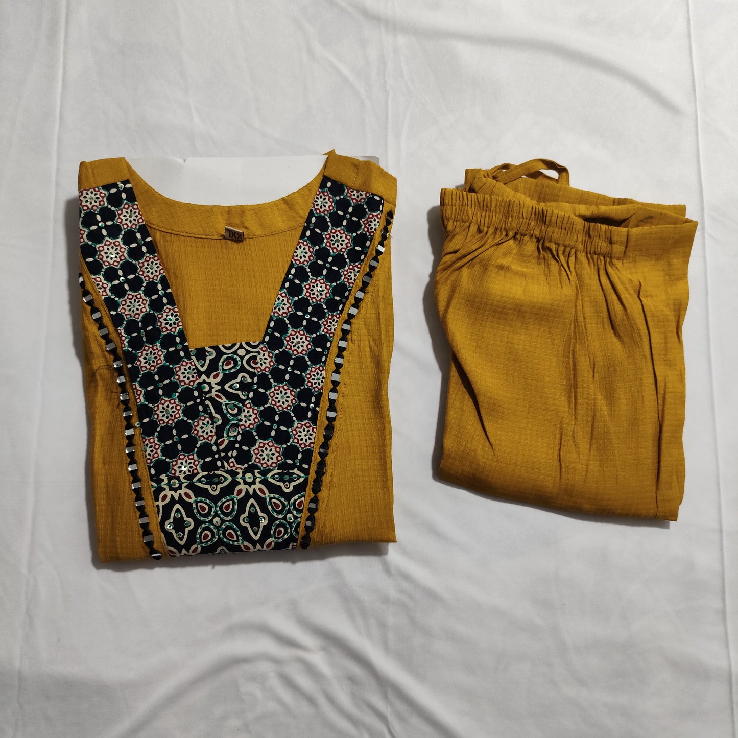 Mustard Yellow Viscose Kurti with black Embroidered Neckline, pocket available