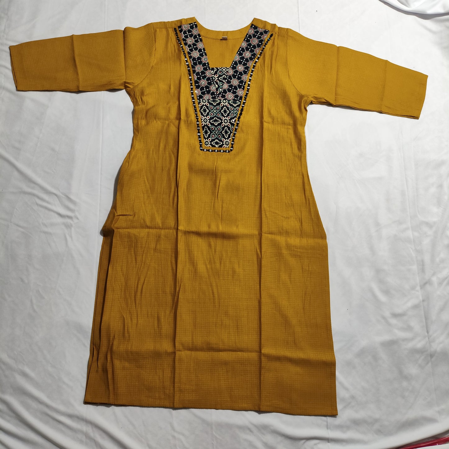 Mustard Yellow Viscose Kurti with black Embroidered Neckline, pocket available