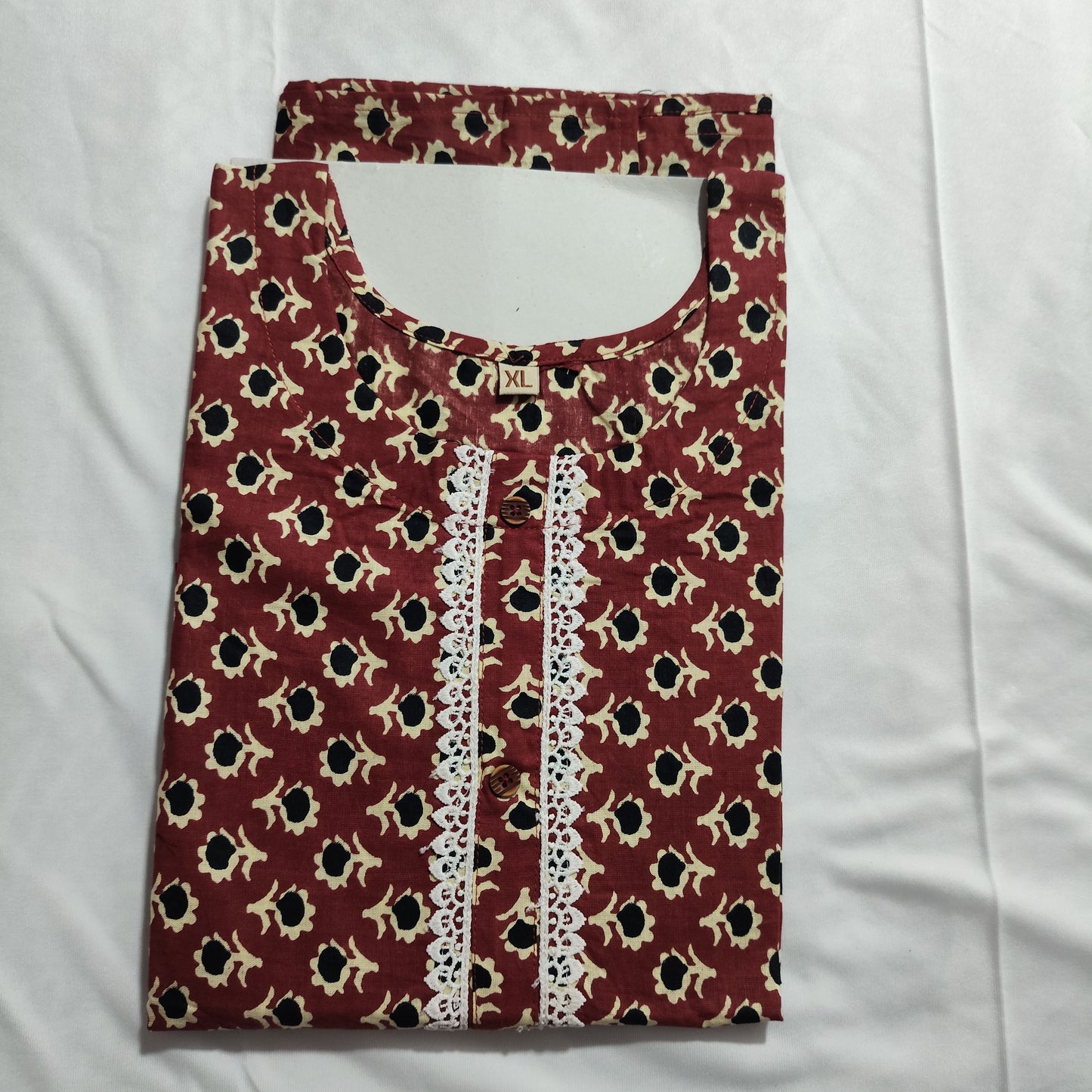Elegant Maroon Floral Cotton Kurti with Lace Detailing – Comfort Fit for Festive & Daily Wear